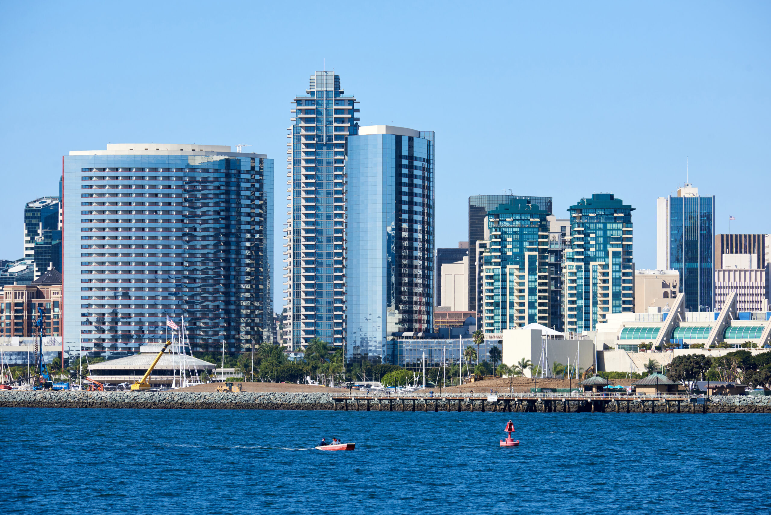 San Diego downtown skyline buildings. California. Sea on foreground